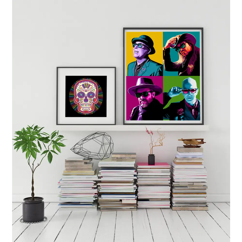 Colorful pop art-style portraits displayed alongside a framed sugar skull image above stacks of books.