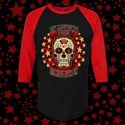 A 3/4 sleeve raglan baseball t-shirt with a black body and red sleeves, featuring a large graphic of a sugar skull with the text 'THE MAVERICKS AND FRIENDS THE MUSIC LIVES ON' on the chest, set against a white background