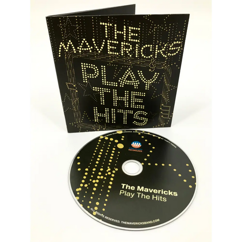 CD album titled ’The Mavericks Play The Hits’ with an open jewel case displaying the cover art.