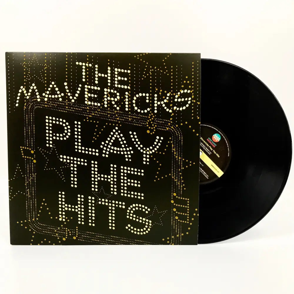 Vinyl record album titled ’The Mavericks Play The Hits’ with illuminated text on the cover.