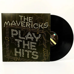 Vinyl record album titled ’The Mavericks Play The Hits’ with illuminated text on the cover.