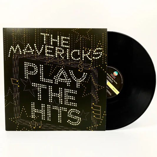 Vinyl record album titled ’The Mavericks Play The Hits’ with illuminated text on the cover.