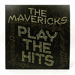 Album cover for ’Play the Hits’ by The Mavericks, featuring illuminated text on a dark background.