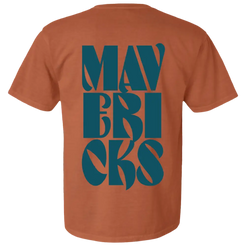 Orange t-shirt with teal ’MAVERICKS’ text stylized vertically on the back.