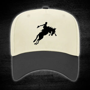 Two-tone baseball cap with rodeo silhouette.